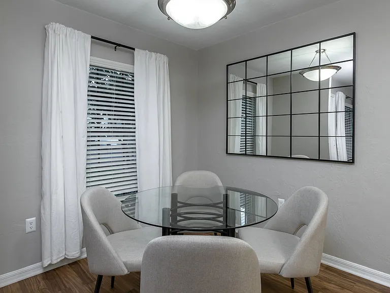Enjoy elegant dining experiences in every apartment with spacious dining areas featuring abundant natural light.