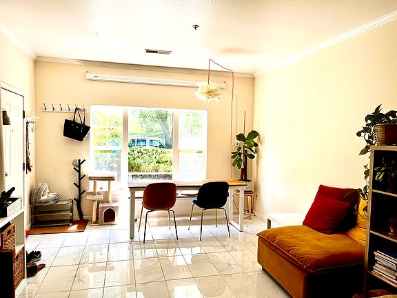 Light-filled living/dining room.