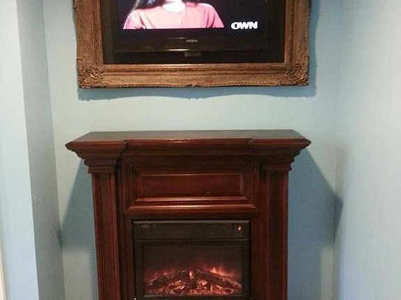 New electric fireplace in suite