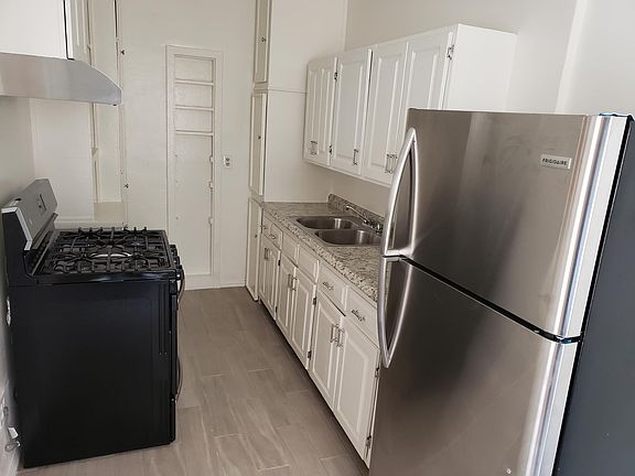 Kitchen with stainless steel appliances.