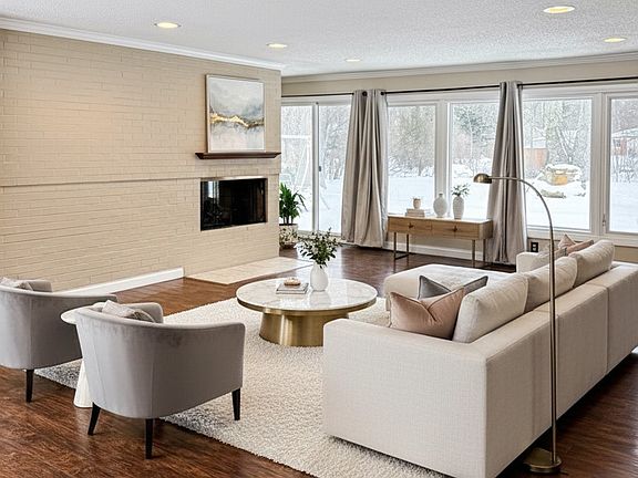 Living room w/ full of natural light