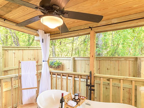 Large outdoor bathtub. This is not a hot tub and does not have jets. Draw a warm bath and use our complementary bath salts.