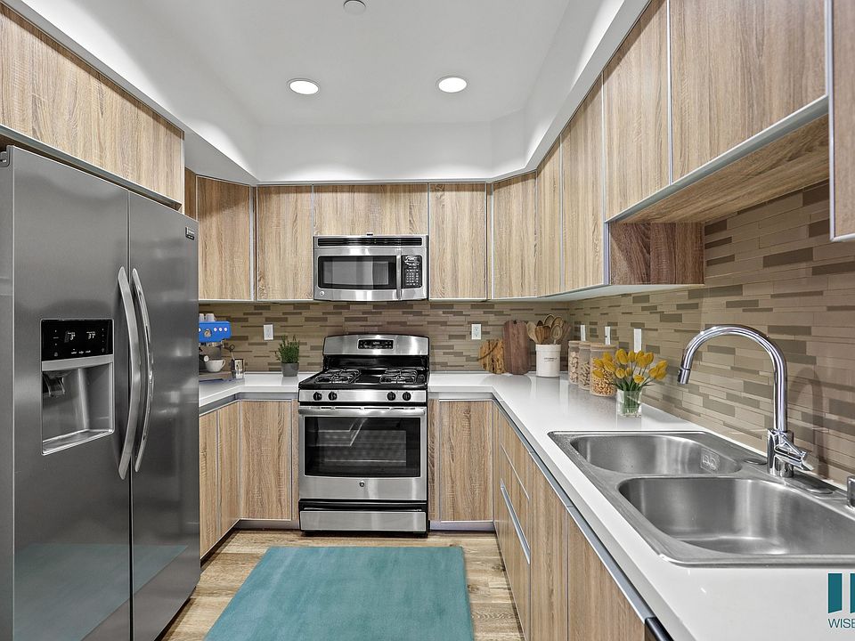 Full-Size Kitchen with Energy-Efficient Appliances and Ample Cabinet Storage