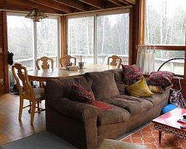 Dining area overlooks deck