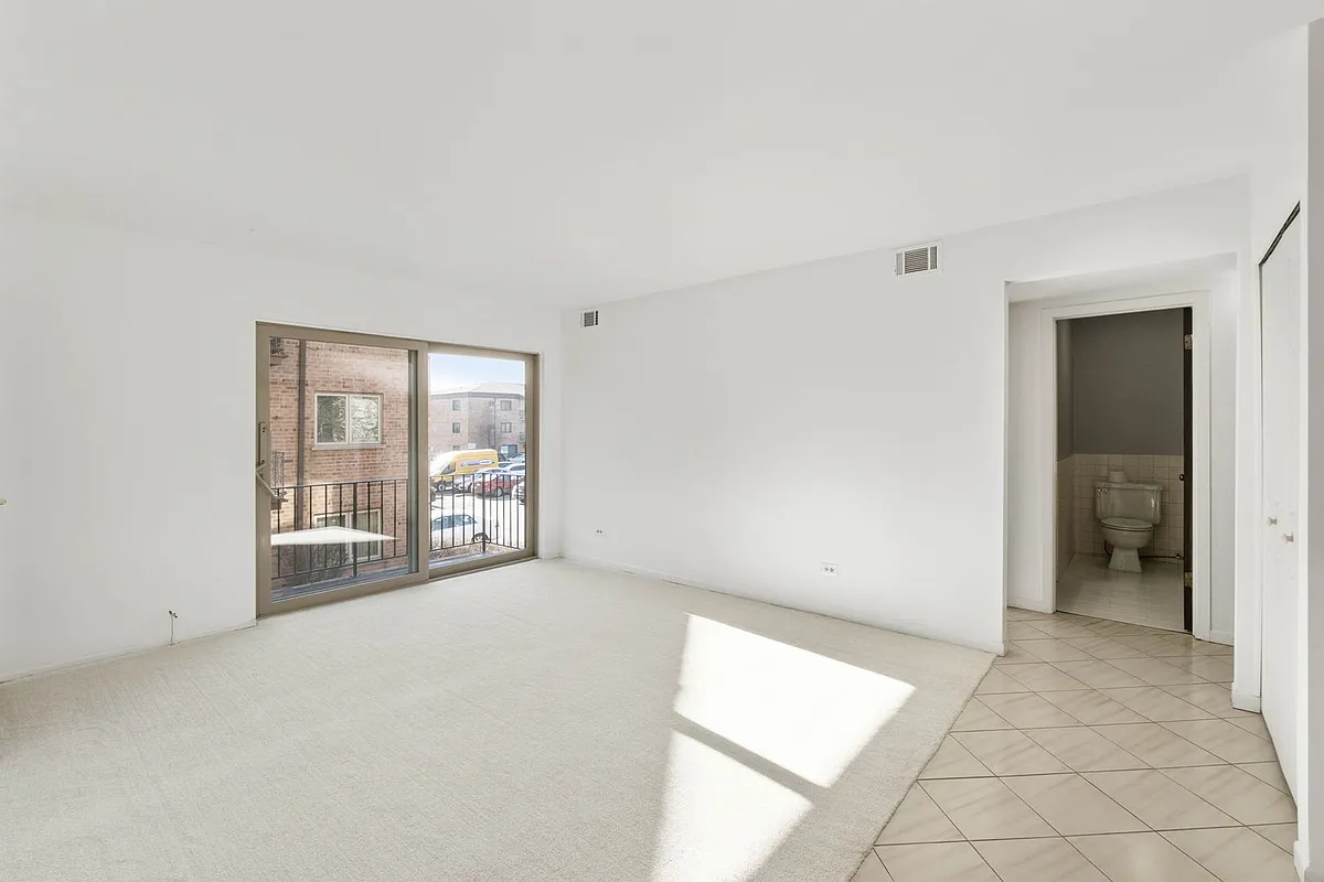 Building Photo - 8423 W Gregory St #201