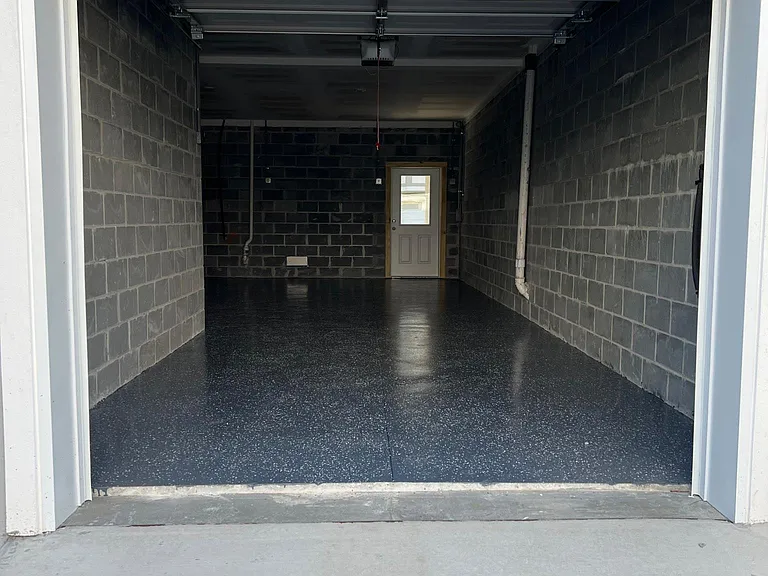 Spacious 2-car garage with extra storage space for bikes and other belongings