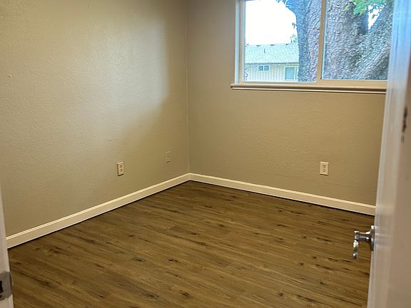 Bedroom 1 looks faces Backyard