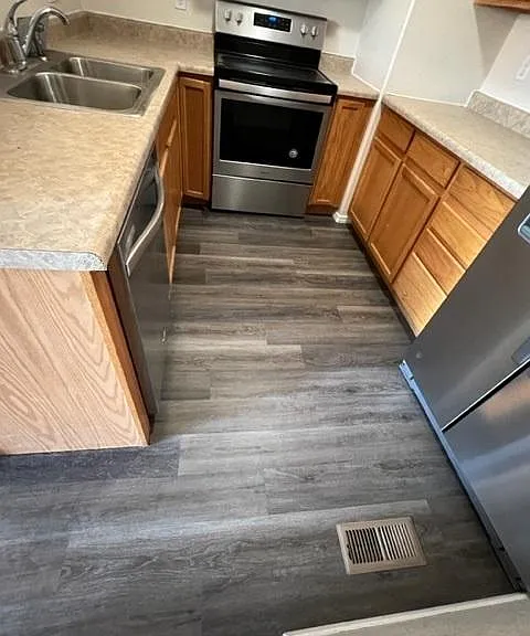 Kitchen showing stainless steel appliances.