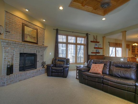 Cozy nights come with this beautiful brick, gas fireplace!