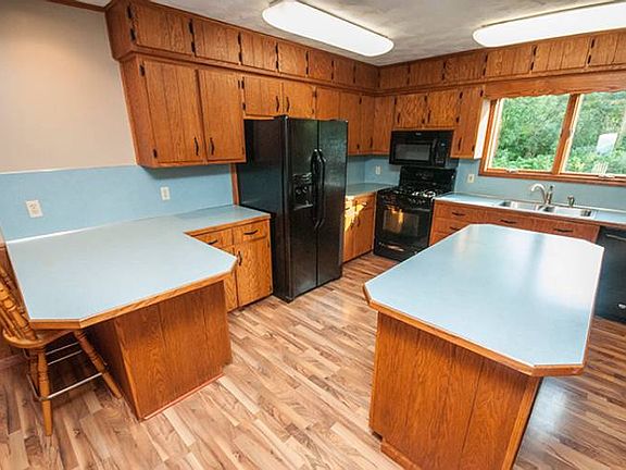 Great kitchen (24X15) with plenty of updates. New floors in 2006, new appliances, and all of the crown molding, and rim is freshly stained. 