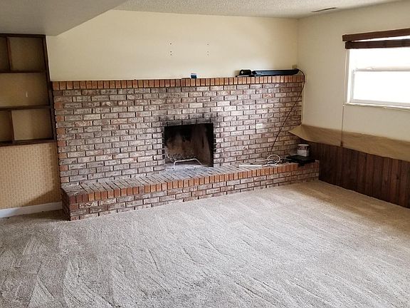 On a cold snowy evening, this wood burning fireplace in the 