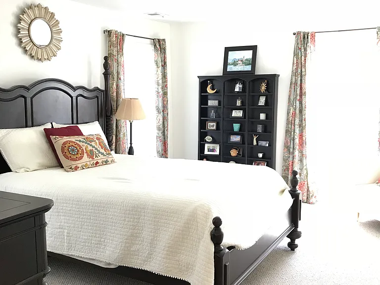 Large master bedroom suite with plentiful windows and light (furniture not included)