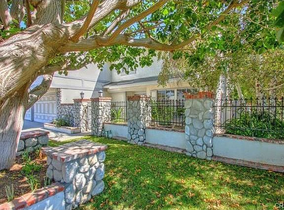 BEAUTIFUL FRONT YARD AND PORCH