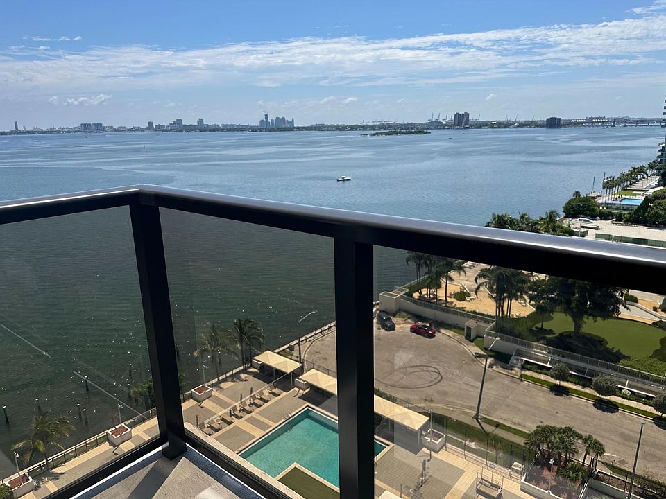 The Bay and Miami Beach view as well as a view of the pool area.