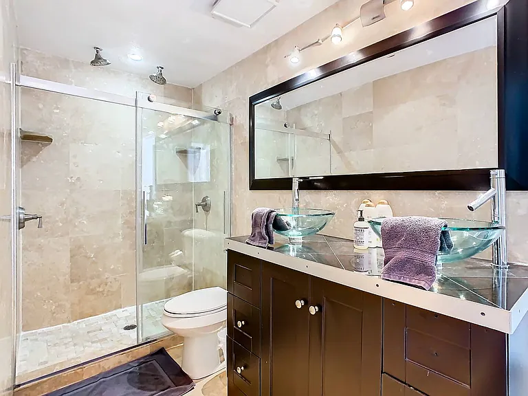 Enjoy the convenience of dual sinks and showers, offering a spa-like escape for your relaxation