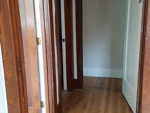 Small hall with hallway closet