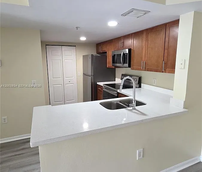 5051 Wiles Rd #201 — Photo 11
