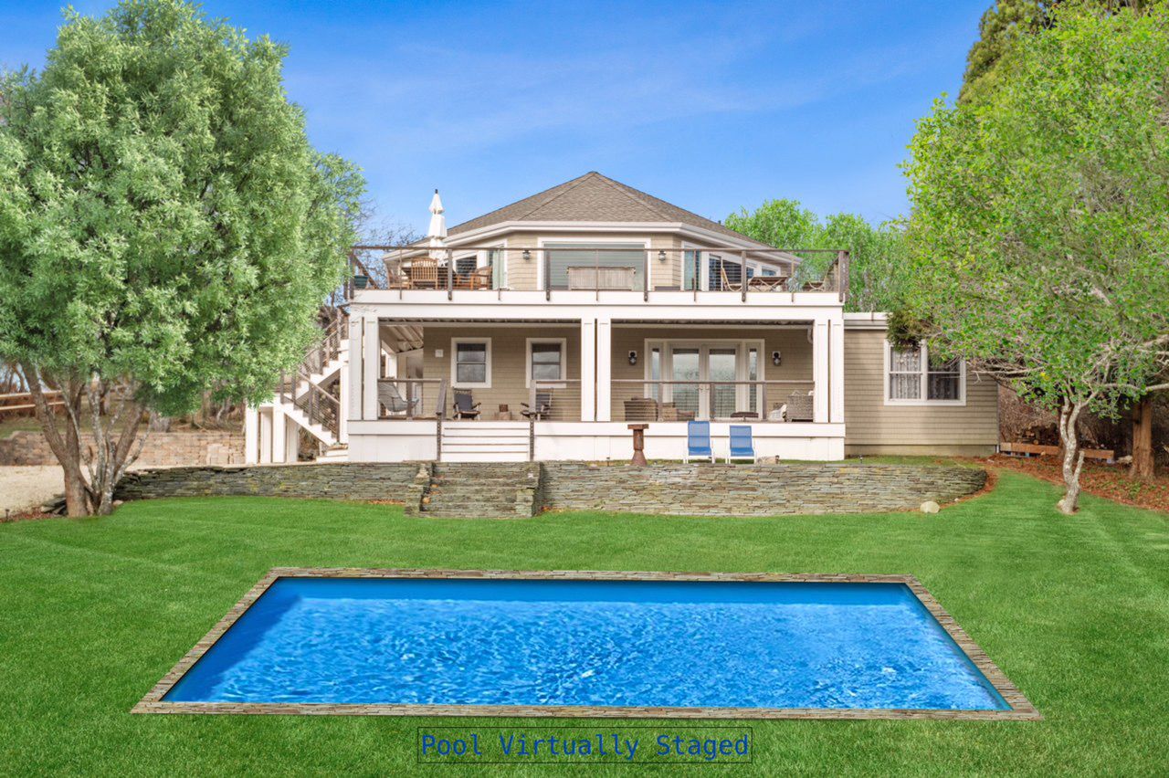  Rolling front lawn with room for pool. 