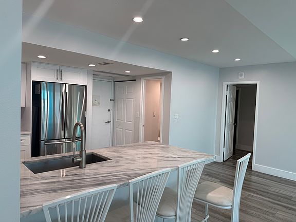 Half bath door, bedroom door and kitchen counter
