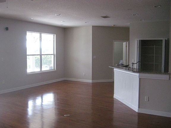KITCHEN BAR AND BREAKFAST AREA