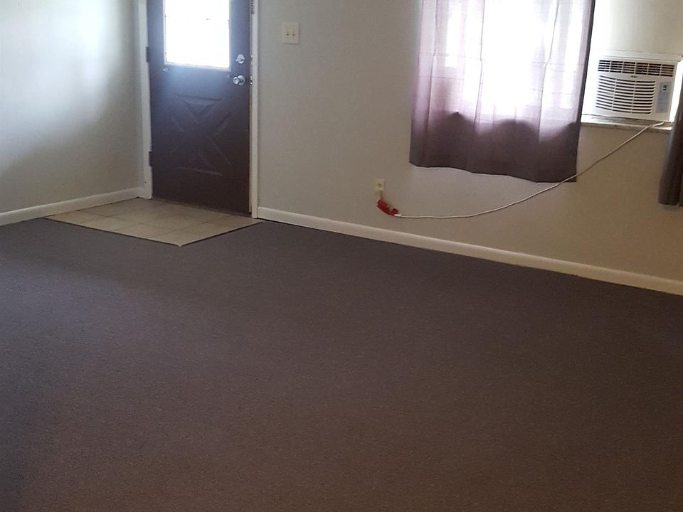 Welcome to your new apartment. Window Coverings Included. Notice the Ceiling Fan.