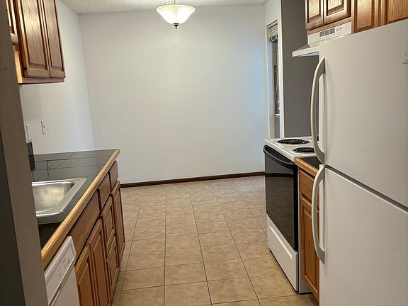 Kitchen looking from hallway toward dining area