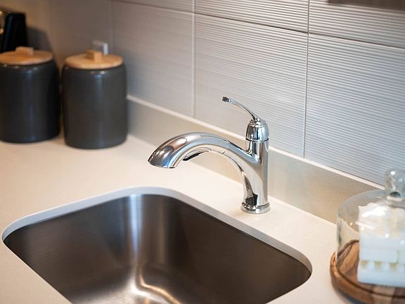 The Byway ; Model #105 Solid Surface Countertops and Modern Backsplash Tile