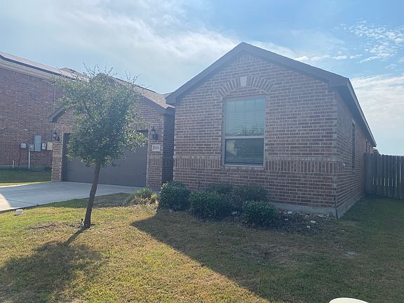 Front with flower bed