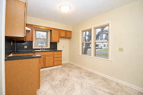 Modern 2BR Ranch with Updated Kitchen & Bath, 2 Car Attached Garage and Large Fenced Yard! Washin... — Photo 2