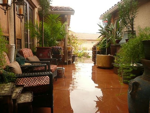 Courtyard View looking toward street w/a Tropical Feel