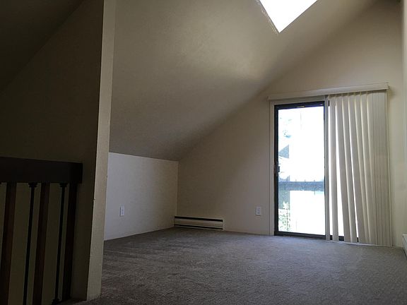 Master bedroom with slider to balcony
