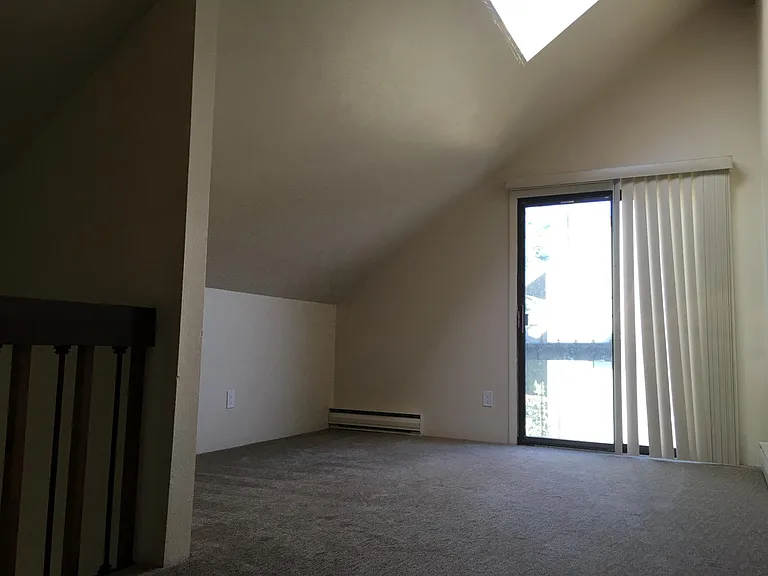 Master bedroom with slider to balcony