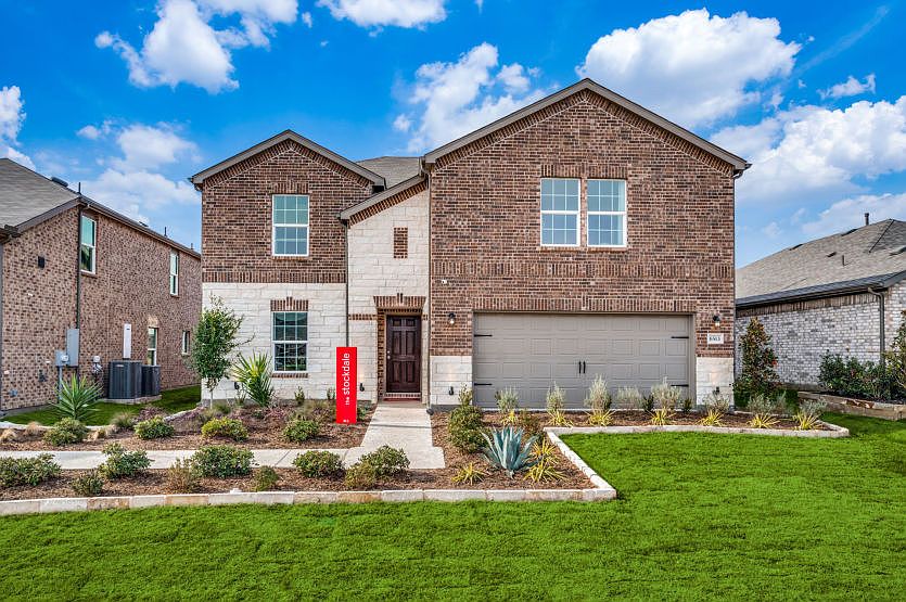 The Stockdale, a two-story home with 2-car garage, shown with Home Exterior Q