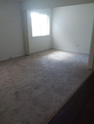 Large living room with possible divider to create a den.