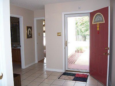 Greet your guest in the large foyer, beautiful storm door.