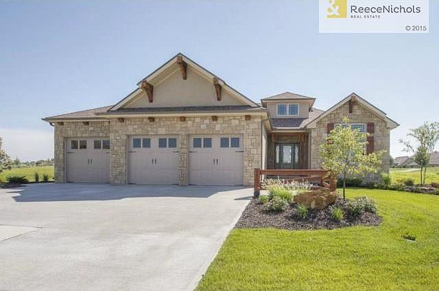 Welcome Home to this Custom Beauty in Falcon Lakes!