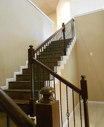 Stair case leading upstairs to living area