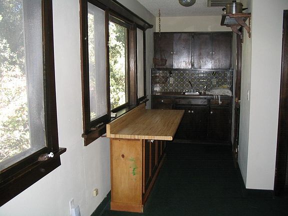 kitchen area with full stove and oven
