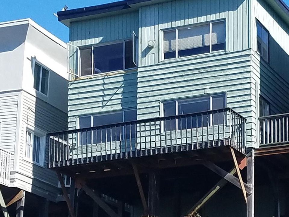 View of the building, facing East from Palantine Ave N. The building is up on a hill, so it has fantastic views over Ballard and Phinney Ridge.