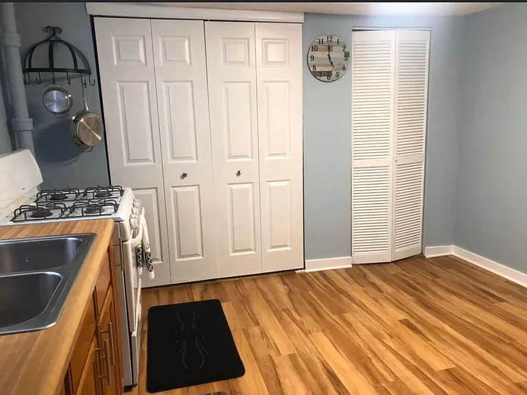 Kitchen: Double door closet is where you would put YOUR washer & dryer. the door on the right is a pantry for extra storage.