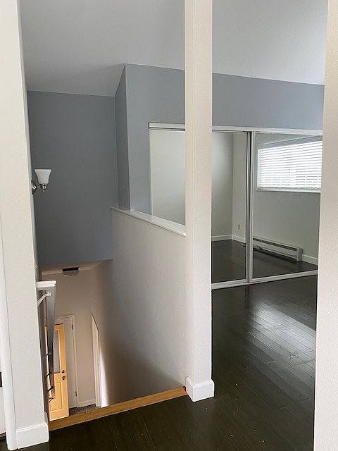Bedroom area, stairway to downstairs room