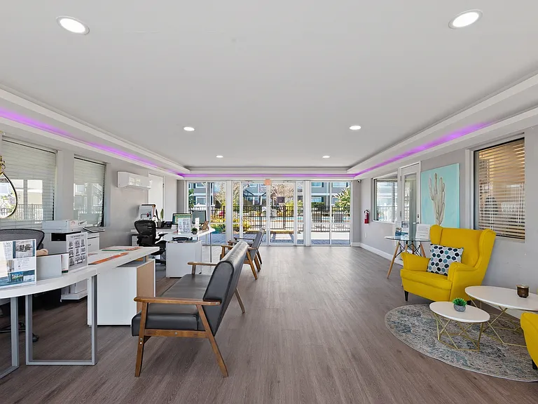 Welcome to Wymore 360 Apartments, where modern design meets comfort. Enjoy our stylish lounge with vibrant accents and ample natural light. Elevate your lifestyle in a community that prioritizes convenience and connection. Schedule your visit today!