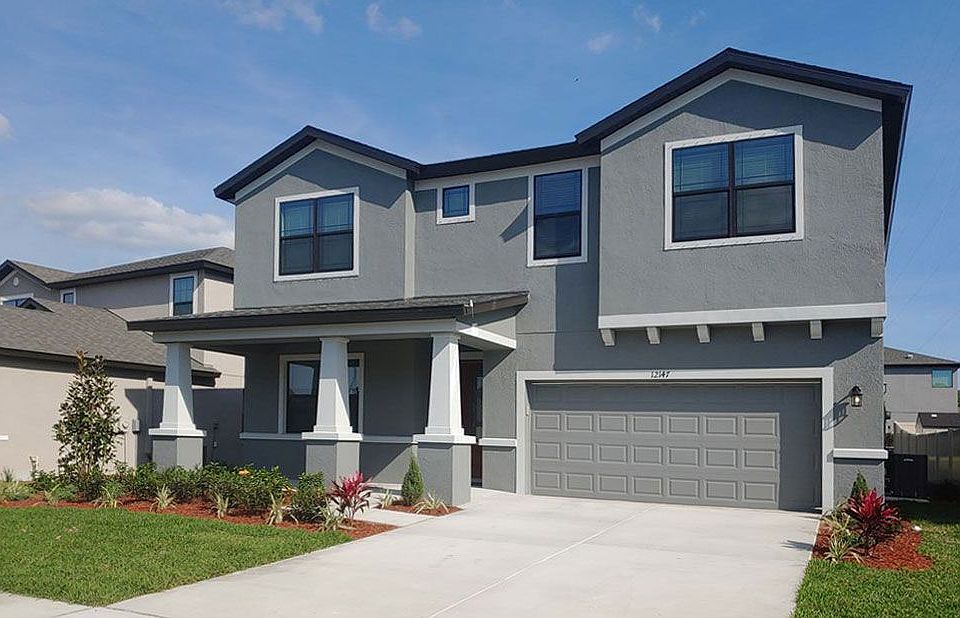 Juniper-FL - French Country elevation new home exterior William Ryan Homes Tampa