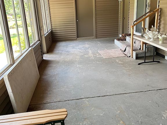 Large screen porch with large storage areas at both ends