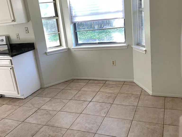 Dining area with bay window.