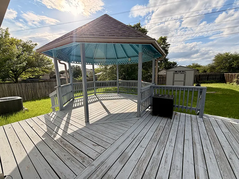 Gazebo in back deck with view and large backyard