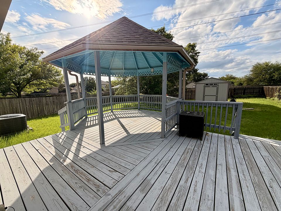 Gazebo in back deck with view and large backyard