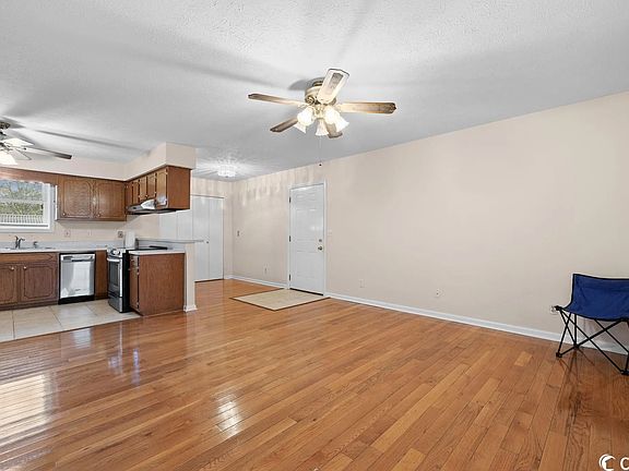 Living Room with view of Kitchen
