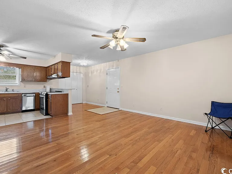 Living Room with view of Kitchen