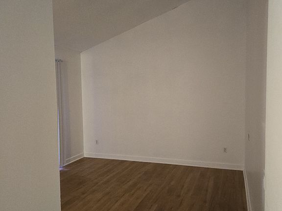 2nd floor bedoom. Has vaulted ceiling, balcony, 2 closets, full bathroom.